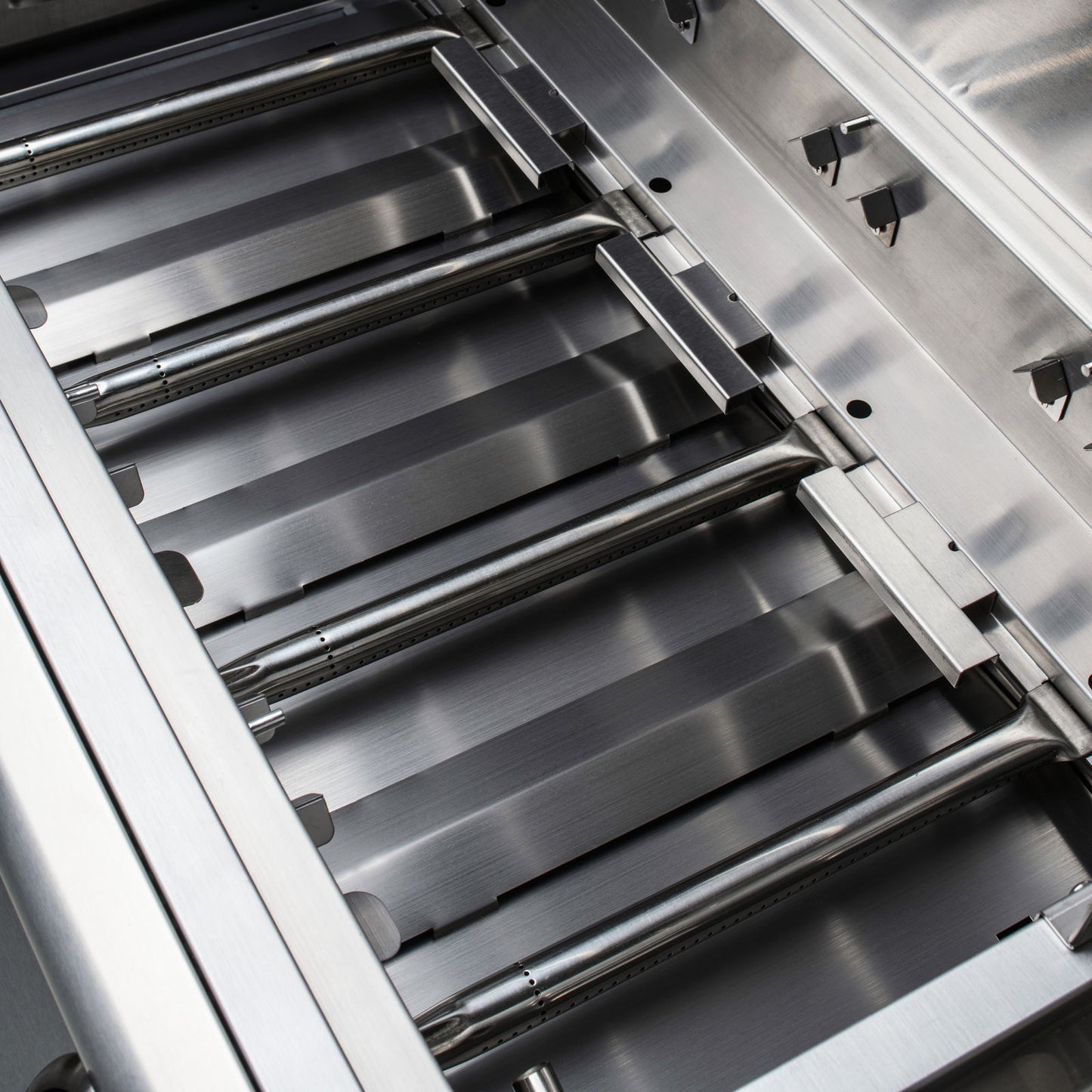 Inside burners on a Blaze 32 Inch LBM Gas Grill