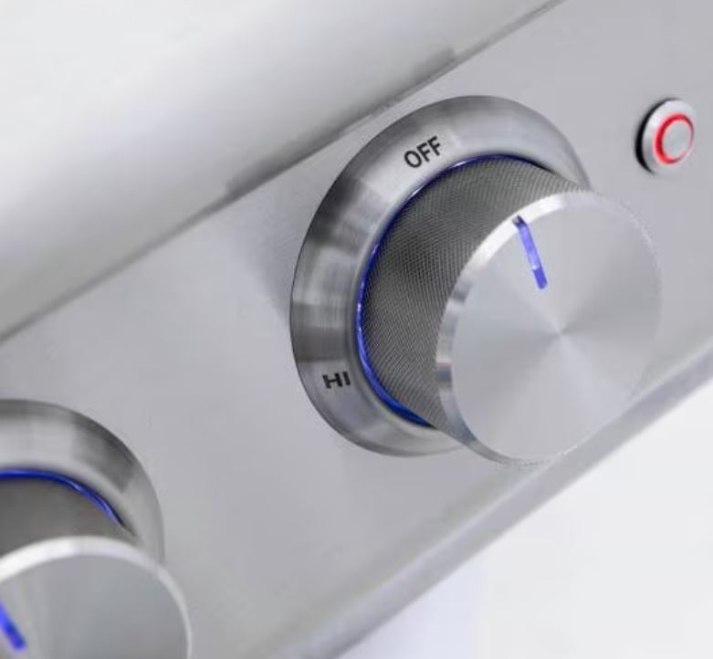 Close-up of the Blaze LTE+ propane gas power burner’s LED-illuminated control knobs, offering precise flame adjustment and a modern design.