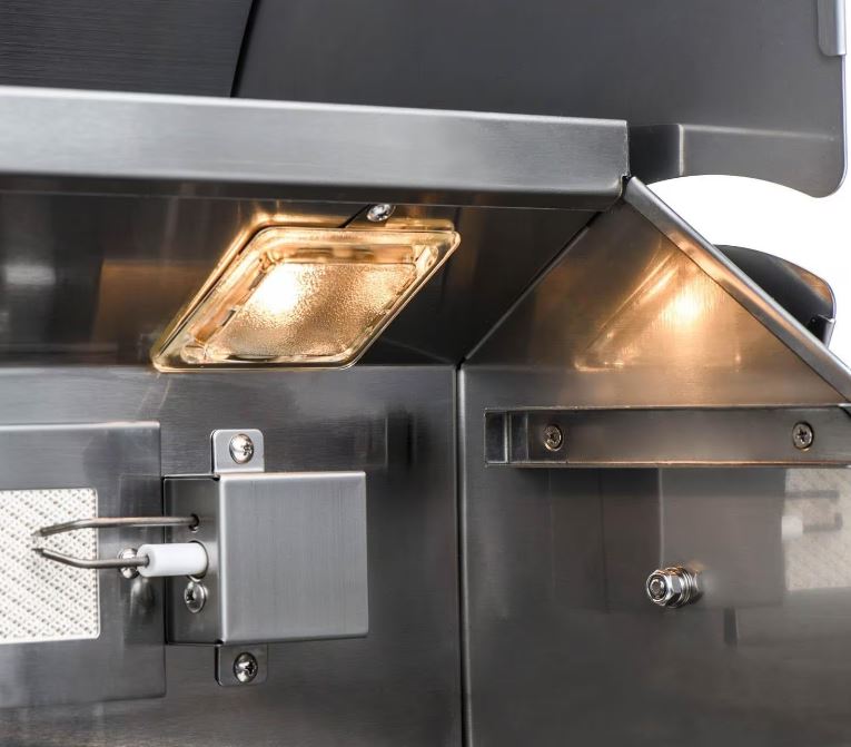 Blaze LTE+ 32-inch propane grill’s built-in halogen interior lights, illuminating the cooking area for nighttime grilling convenience.