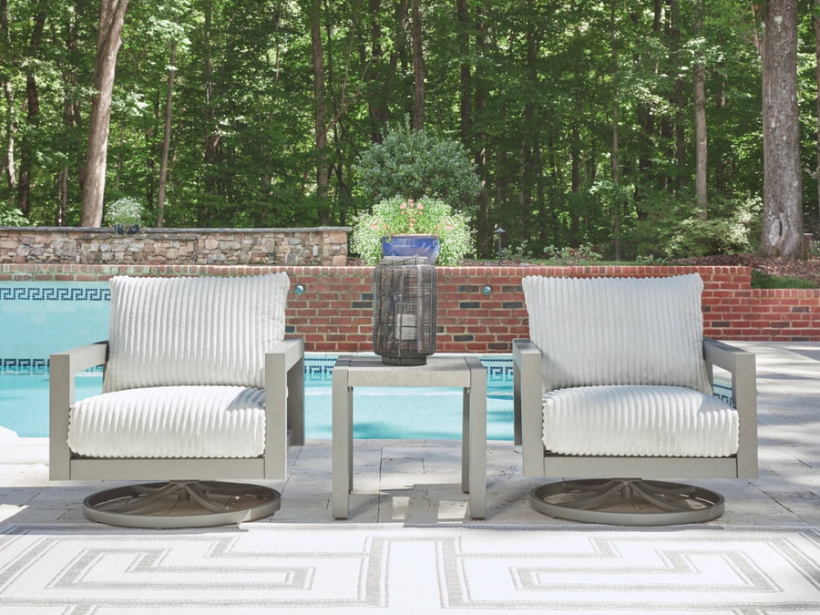 Ashley Furniture Moonlight View Outdoor Set of two Swivel Chairs in a backyard lifestyle image